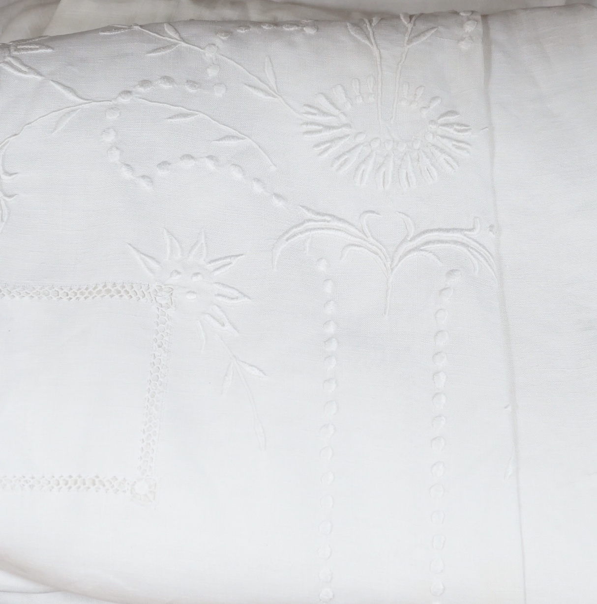 Eight French provincial coarse linen sheets and an embroidered sheet, a monogrammed sheet and an embroidered and monogrammed finer linen sheet (11)